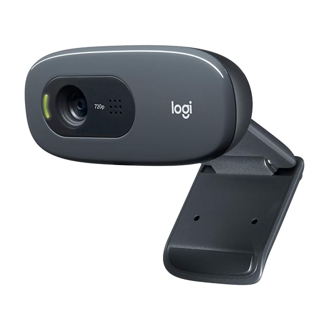 Kleine schwarze Webcam Logitech C270 oben an einem Monitor festgeklemmt